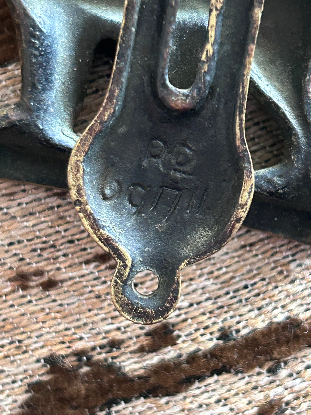 A striking vintage brass door knocker featuring a beautifully detailed English Setter hunting dog design, 1922-1930